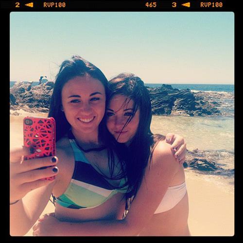 Rachel Fox in a bikini taking a selfie