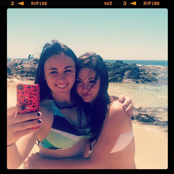 Rachel Fox in a bikini taking a selfie