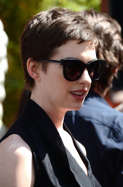Anne Hathaway Christopher Nolan immortalized with hand and footprint ceremony on July 7, 2012