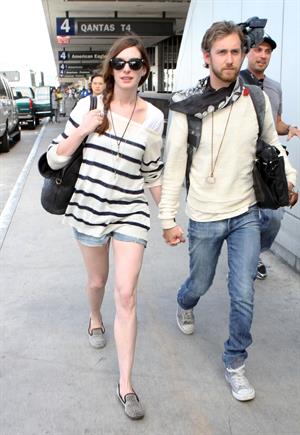 Anne Hathaway arrives at LAX airport in Los Angeles on September 3, 2011