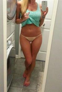 Anonymous in lingerie taking a selfie