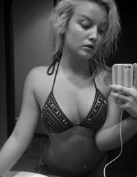 Anonymous in a bikini taking a selfie