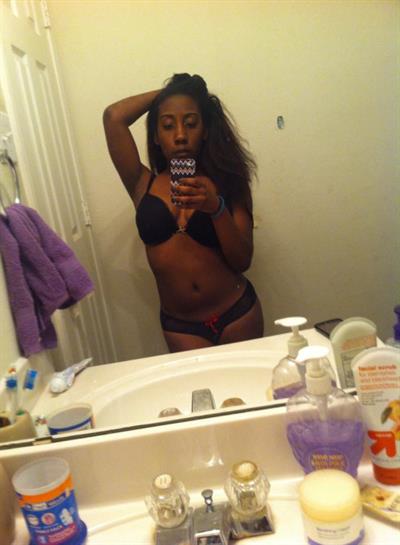 Anonymous in lingerie taking a selfie