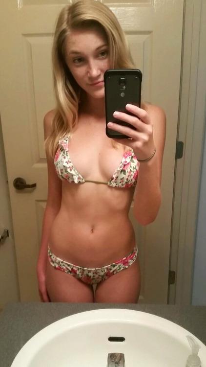 Anonymous in a bikini taking a selfie