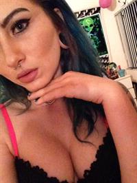 Anonymous in lingerie taking a selfie