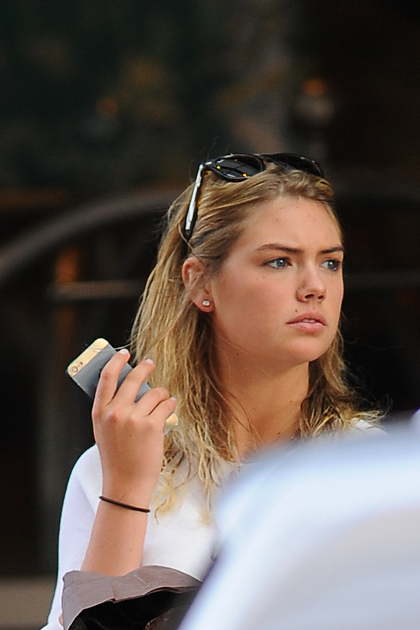 Kate Upton on her phone in New York City on June 21, 2013