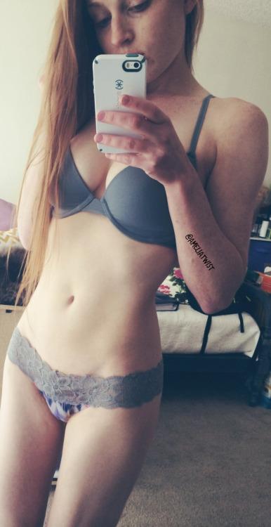 Anonymous in lingerie taking a selfie
