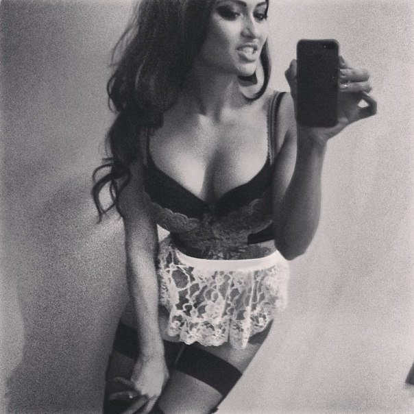 Anonymous in lingerie taking a selfie