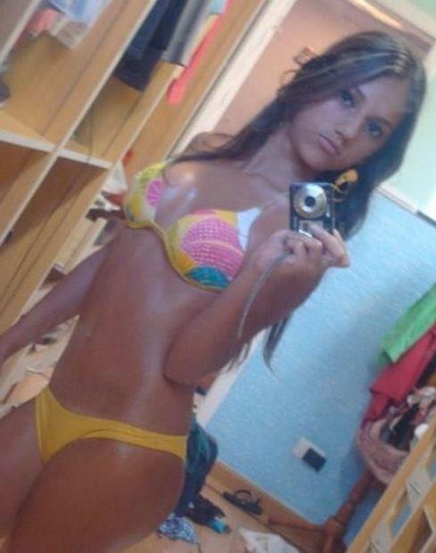 Anonymous in a bikini taking a selfie