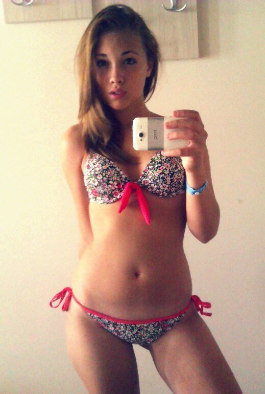 Anonymous in a bikini taking a selfie