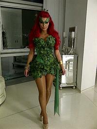 Kim Kardashian as Poison Ivy for the 2011 Midori Green Halloween party in New York