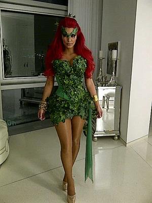 Kim Kardashian as Poison Ivy for the 2011 Midori Green Halloween party in New York