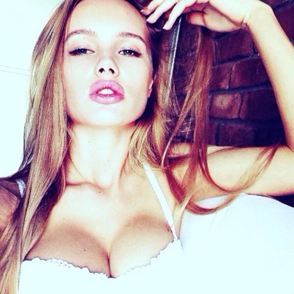 Olya Abramovich in lingerie taking a selfie