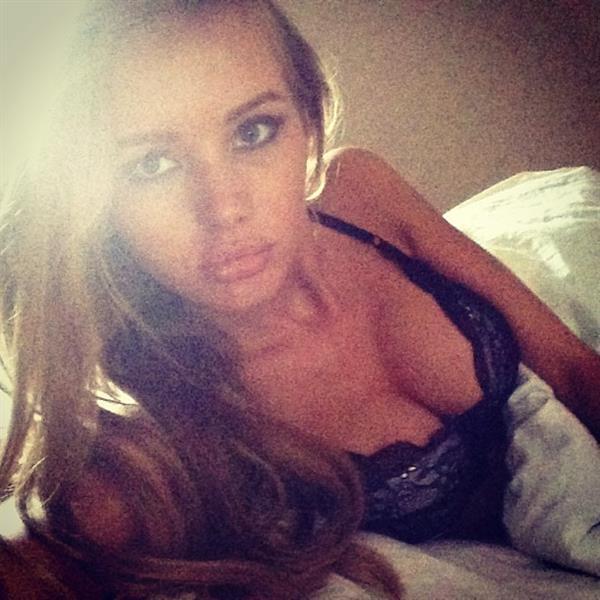 Olya Abramovich in lingerie taking a selfie