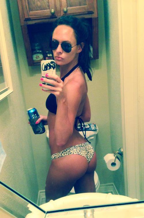 Anonymous in a bikini taking a selfie and - ass