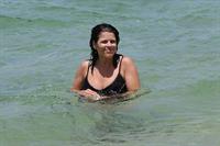 Neve Campbell in a bikini