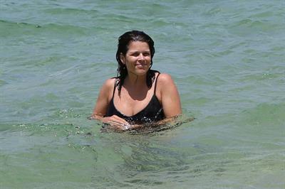 Neve Campbell in a bikini