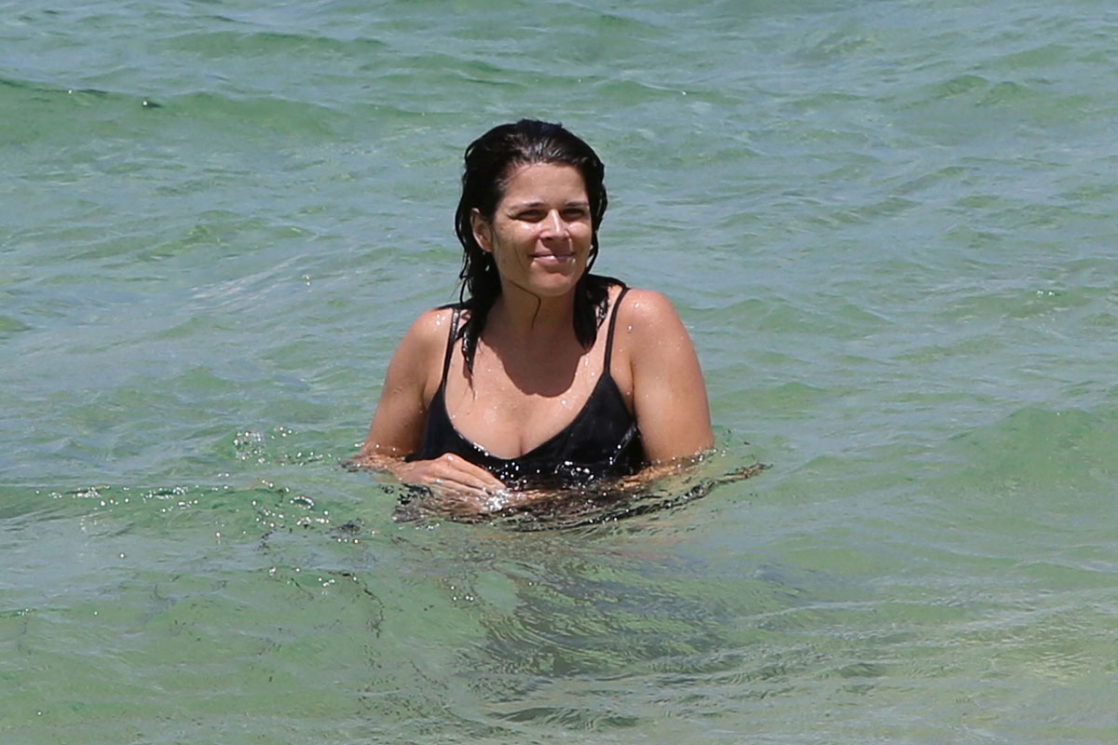 Neve Campbell in a bikini