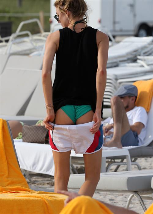 Martha Hunt in a bikini - ass