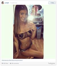 Carlie Jo in lingerie taking a selfie