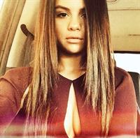 Selena Gomez taking a selfie