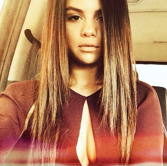 Selena Gomez taking a selfie