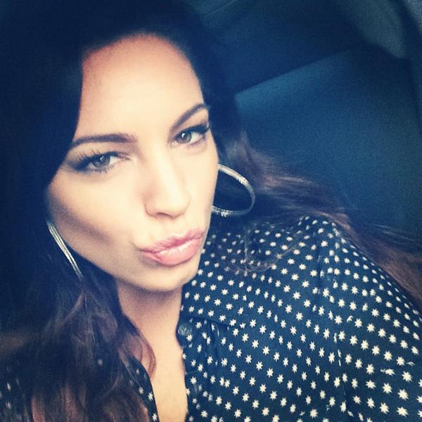 Kelly Brook taking a selfie