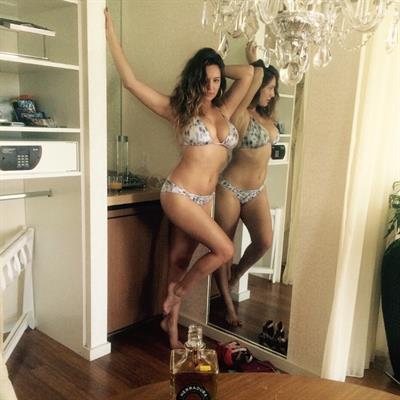 Kelly Brook in a bikini taking a selfie