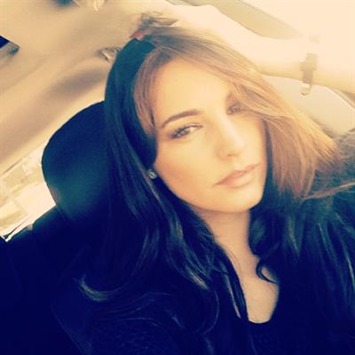 Kelly Brook taking a selfie