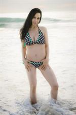 Nadya Suleman is better known as Octomom.  She was born Natalie Denise Suleman on July 11, 1975.  After 14 children she is stripping and making porn...  Here she is in a bikini