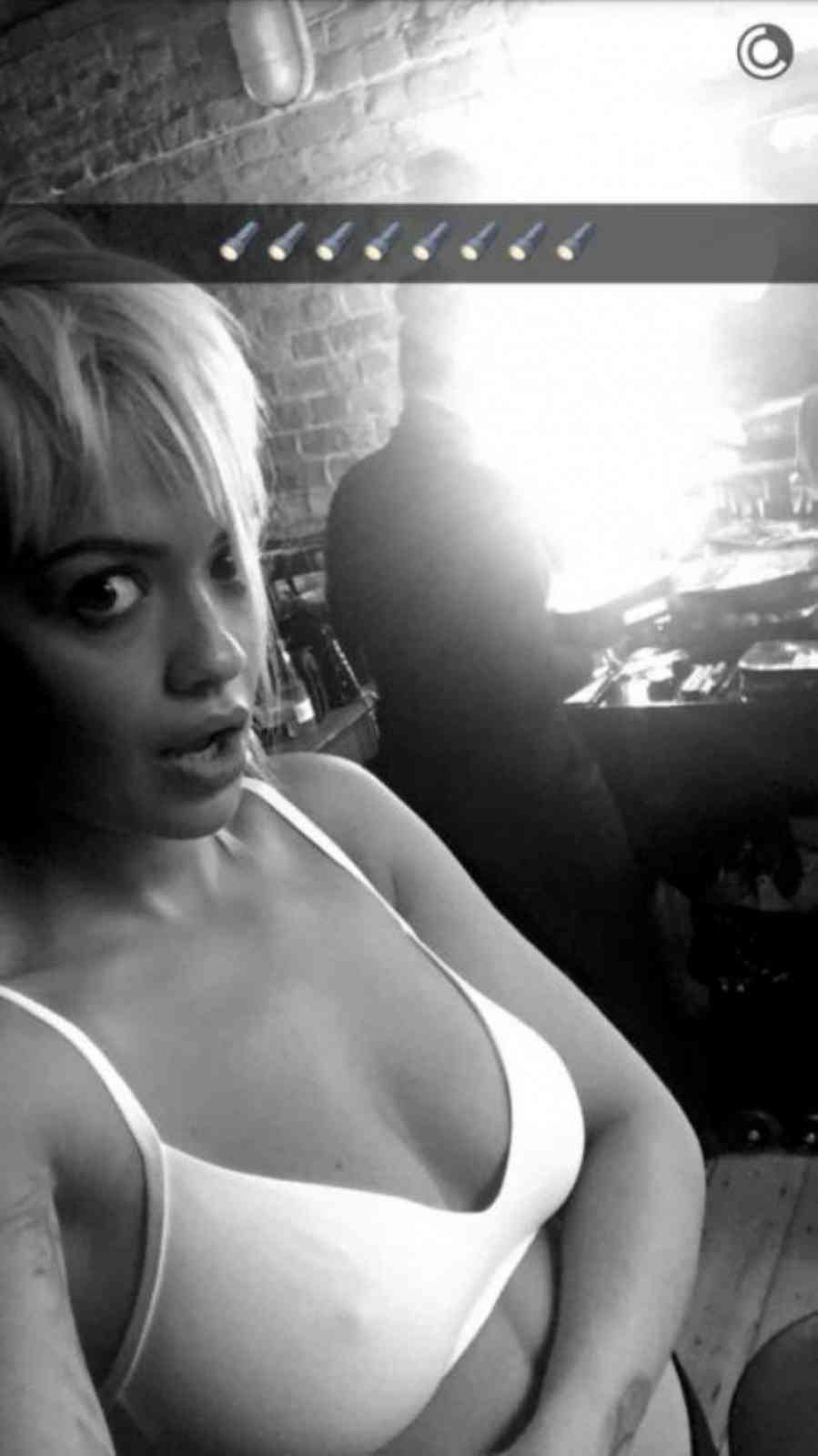 Rita Ora in a bikini taking a selfie