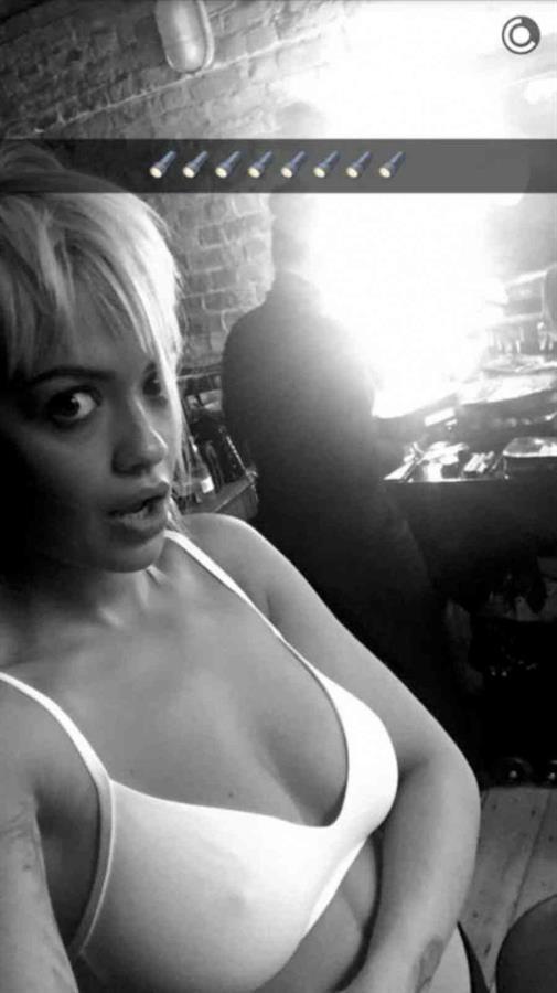 Rita Ora taking a selfie