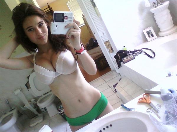 Angie Varona in lingerie taking a selfie