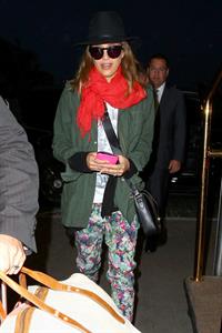 Jessica Alba arrives for an early morning flight at LAX, June 10, 2014