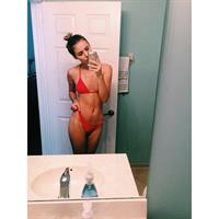 Celina Eriksen in a bikini taking a selfie