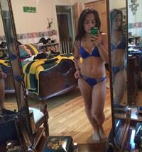 Anonymous in a bikini taking a selfie