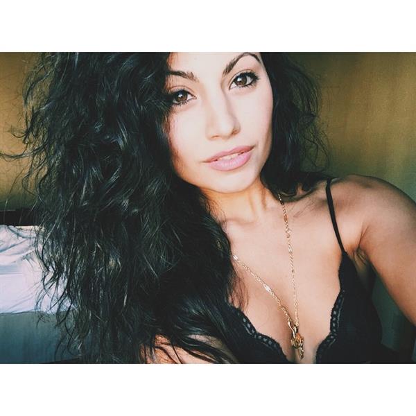 Mónica Alvarez in lingerie taking a selfie