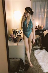 Anonymous in lingerie taking a selfie