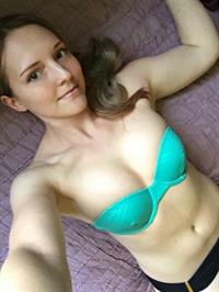 Anonymous in lingerie taking a selfie