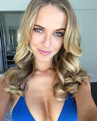 Olivia Jordan in a bikini taking a selfie