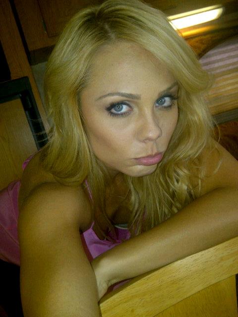 Laura Vandervoort taking a selfie