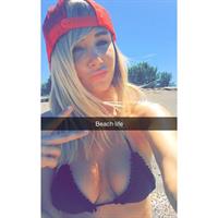 Sara Jean Underwood in a bikini taking a selfie