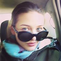 Kristina Romanova taking a selfie