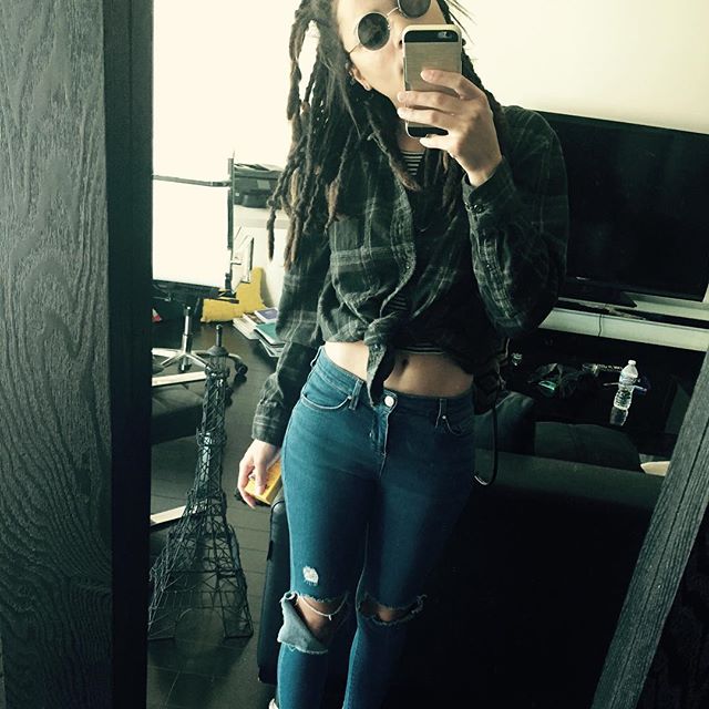 Sasha Lane taking a selfie