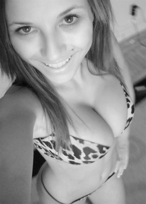 Jamilya Damon in a bikini taking a selfie