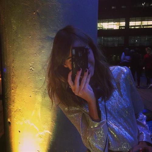 Alexa Chung taking a selfie