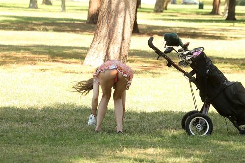 Alicia Arden golfing in a tiny skirt.  Upskirt pink panties.