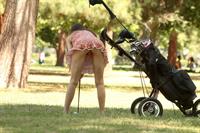 Alicia Arden golfing in a tiny skirt.  Upskirt pink panties.
