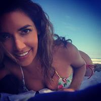 Mercedes Terrell in a bikini taking a selfie