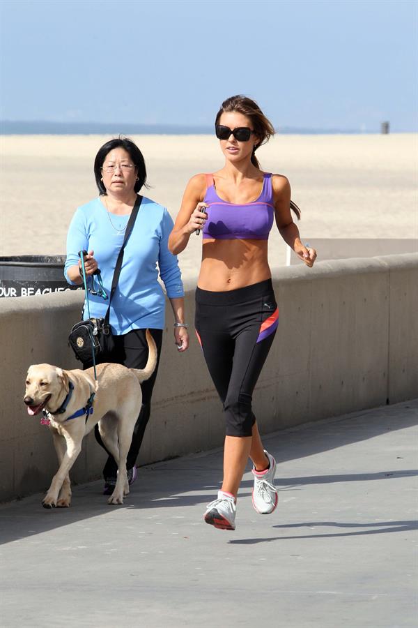 Audrina Patridge running on the beach in the South Bay
